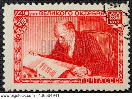 A Postage Stamp Printed In The Ussr Depicts Vladimir Lenin Ulyanov Reading The Pravda Newspaper, 40t