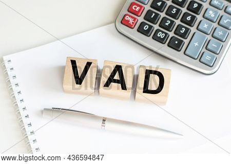 Word Vad Made With Wood Building Blocks On Office Desk Business Concept