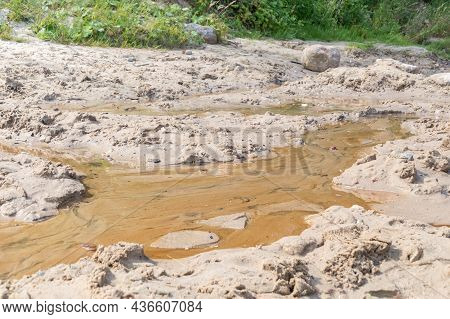 Small Stream On The Beach By The Baltic Sea.