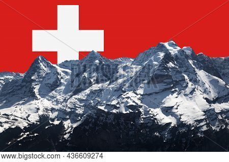 Eiger Monk And Jungfrau Mountain Range In The Swiss Alps, Swiss Flag As Big Red Large Symbol In The 