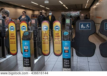 Vancouver,canada - August 25,2021: View Of Sign On A Skytrain Station Face Covering Are Mandatory On