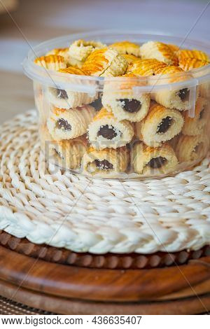Traditional Pineapple Jam Tart Roll Cookies Or A Malay Called Tart Nanas In A Plastic Container.