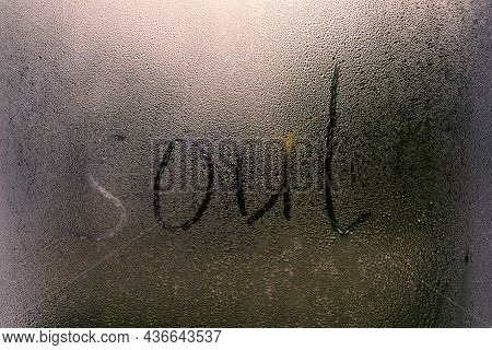 Foggy Glass On A Window With Written Finger Word Soul. Concept Photo With Copy Space