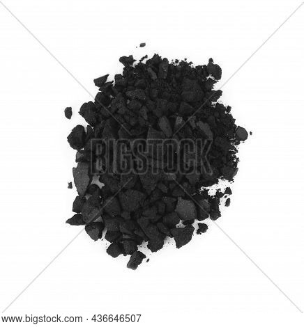 Pile Of Crushed Activated Charcoal Pills On White Background, Top View. Potent Sorbent