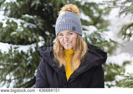 Portrait Beautiful Happy Girl Whitework Smile Teeth, Blue Eyes On Spruce Background In Frosty Day. A