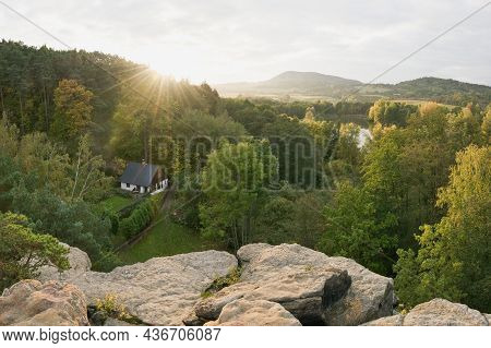 Peklo, Czech Republic - October 16, 2021: Sunset In Autumnal Landscape