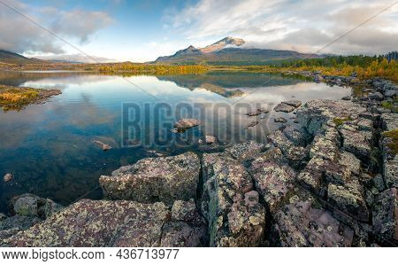 Mountain And Sky Reflecting In Lake In Early Morning Of Autumn. Autumn Colors In Remote Arctic Lands