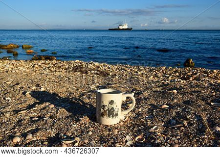 A Tea Mug With A Drawing Of A Family Of Mice Standing On The Shell Shore. Kerch. Crimea. August 2020