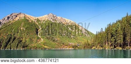 Tatra National Park, Poland. Panorama of mountains lake Morskie Oko Or Eye of the Sea In autumn. Beautiful Tatras Landscape.