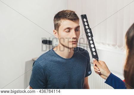 Ophthalmologist Examines Patient's Eyes. Hospital, Clinic, Medical Examination. Vision Tests At Hosp