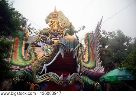 Sakon Nakhon,thailand - October 1 , 2020 : A Large Golden Seated Buddha Statue Outdoors, Sheltered B