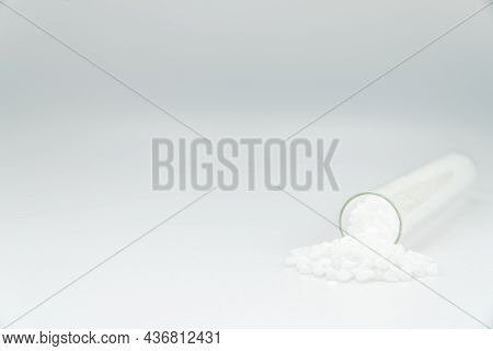 White Plastic Beads On Wood  Background, Polymers Bead Or Polymer Resin, Polymer Pallet, Product Fro