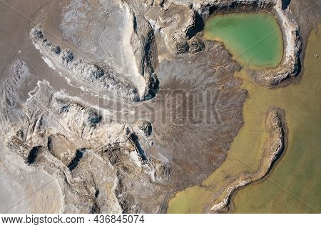 Drone View Of The Turquoise Lake Formed As A Result Of Mining Waste