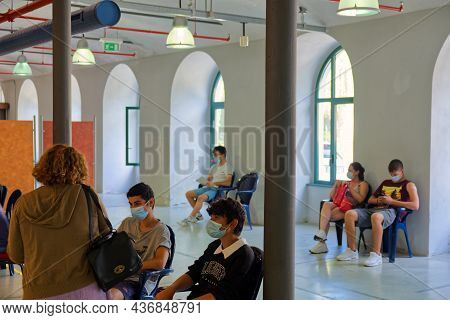 Rivarolo, Italy - 2 August 2021: Students Queuing To Receive The Dose Of Anti-covid Vaccine In A Vac