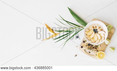Oatmeal Dryfruits With Bird Paradise Flower White Background. High Quality Beautiful Photo Concept
