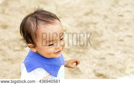 Close-up Of The Boy's Face Of The Rollick In An Playground.