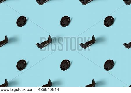 A Pattern Of Photo Accessories - Lens Caps And Lens Hoods.