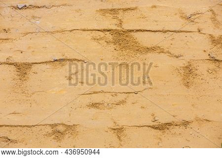 Close-up View Of Rammed Sand Surface Compacted With Vibratory Plate Compactor - Prepaired For Macada