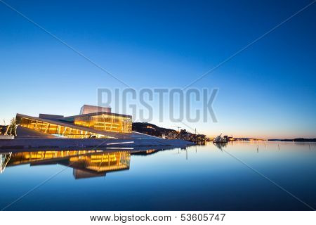 OSLO, NORWAY - JANUARY 1: National Oslo Opera House shines at sunrise on January 1, 2013. Oslo Opera House was opened on April 12, 2008 in Oslo, Norway