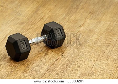 Nine kg weight for workingout on the floor at the gym.