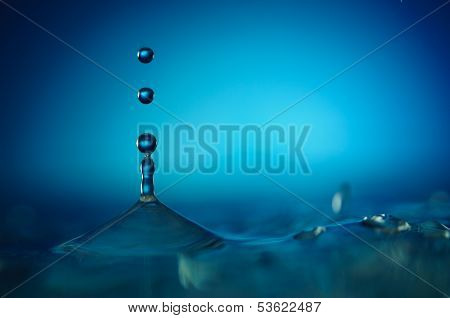 Three blue water drops