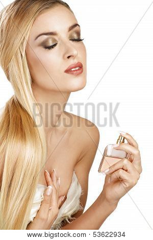 Elegant Woman Applying Perfume On Her Body
