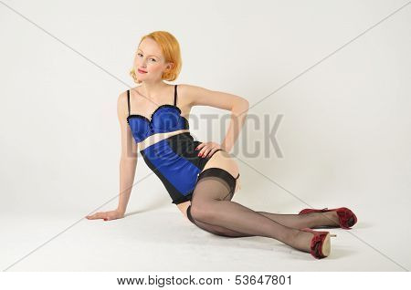 Red head in retro blue underwear