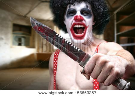 Knife Wielding Horror Clown in Condemned Building