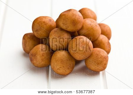 marzipan balls on white kitchen table