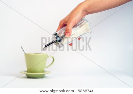 Despeje o açúcar ao café