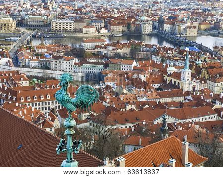 The View Over Prague Town And The Vltava River From The Tower Of St. Vitus Cathedral