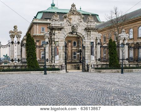 The Gate Of The Buda Castle In Budapest On A Cloudy Spring Day