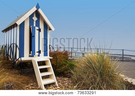 Striped Blue Beach Hut On Filey Promenade