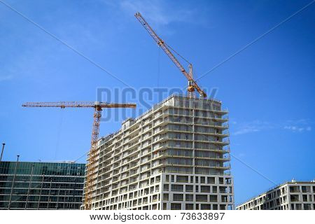 New Houses Under Construction On Building Site