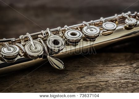 Modern Concert Flute On A Wood Table