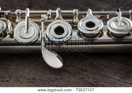Modern Concert Flute On A Wood Table