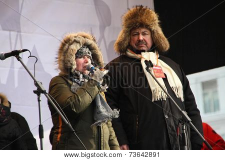 The representative of Russia sitting Olga Romanova and politician Gennady Gudkov