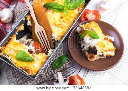 Greek moussaka with mushrooms and tomatoes