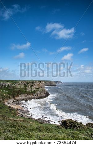 Summer Landscape Of Worm's Head And Rhosilli Bay In Wales