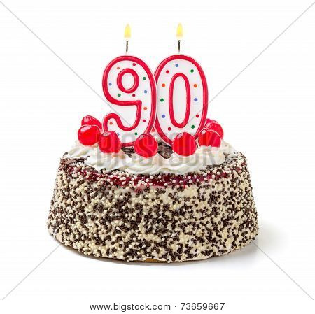 Birthday cake with burning candle number 90