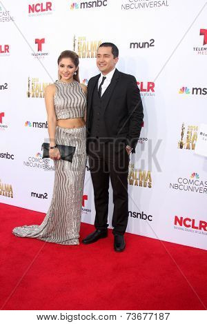 LOS ANGELES - OCT 10:  Josephine Ochoa, Rick Mancia at the ALMA Awards Arrivals 2014 at Civic Auditorium on October 10, 2014 in Pasadena, CA