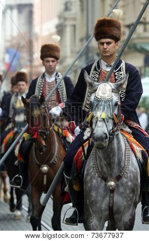 ZAGREB, CROATIA - OCTOBER 04: The parade of 70 participants, thirty horses and forty members of a brass band to the main square were announced next, 300th Sinjska Alka, on October 04, 2014 in Zagreb.