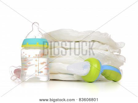 New Born Child Stack Of Diapers Nipple Soother Baby Feeding Milk Bottle