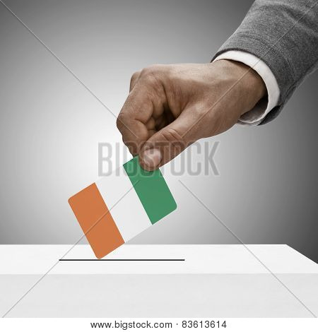 Black Male Holding Flag. Voting Concept - Republic Of Cote D'ivoire - Ivory Coast
