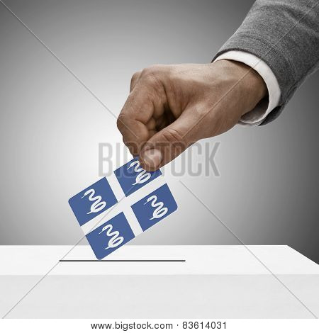 Black Male Holding Flag. Voting Concept - Martinique