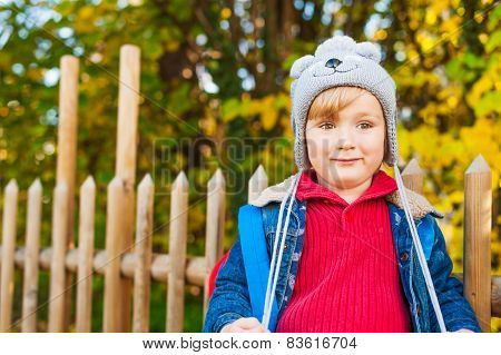 Autumn portrait of adorable tottler boy