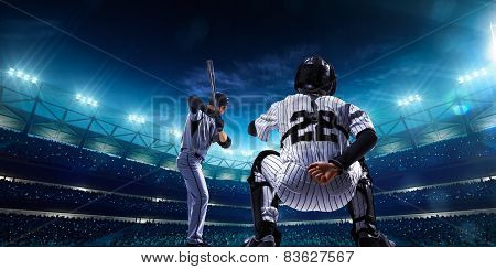 Professional baseball players on night grand arena