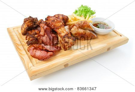 Restaurant Food Isolated - Grilled Meat Assortment Served On Wooden Board