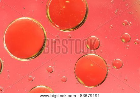 Grungy pink and red abstract oil and water abstract