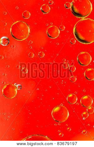 Vivid red oil and water abstract
